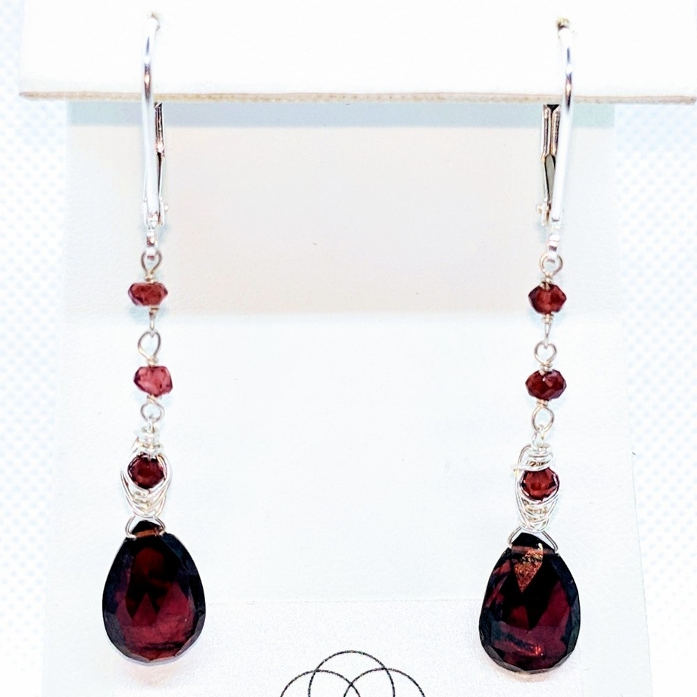 Garnet and 92.5 sterling silver earrings $50